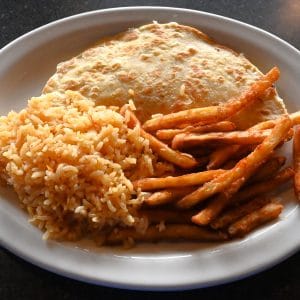 Kids #5. Quesadilla served with rice and fries.